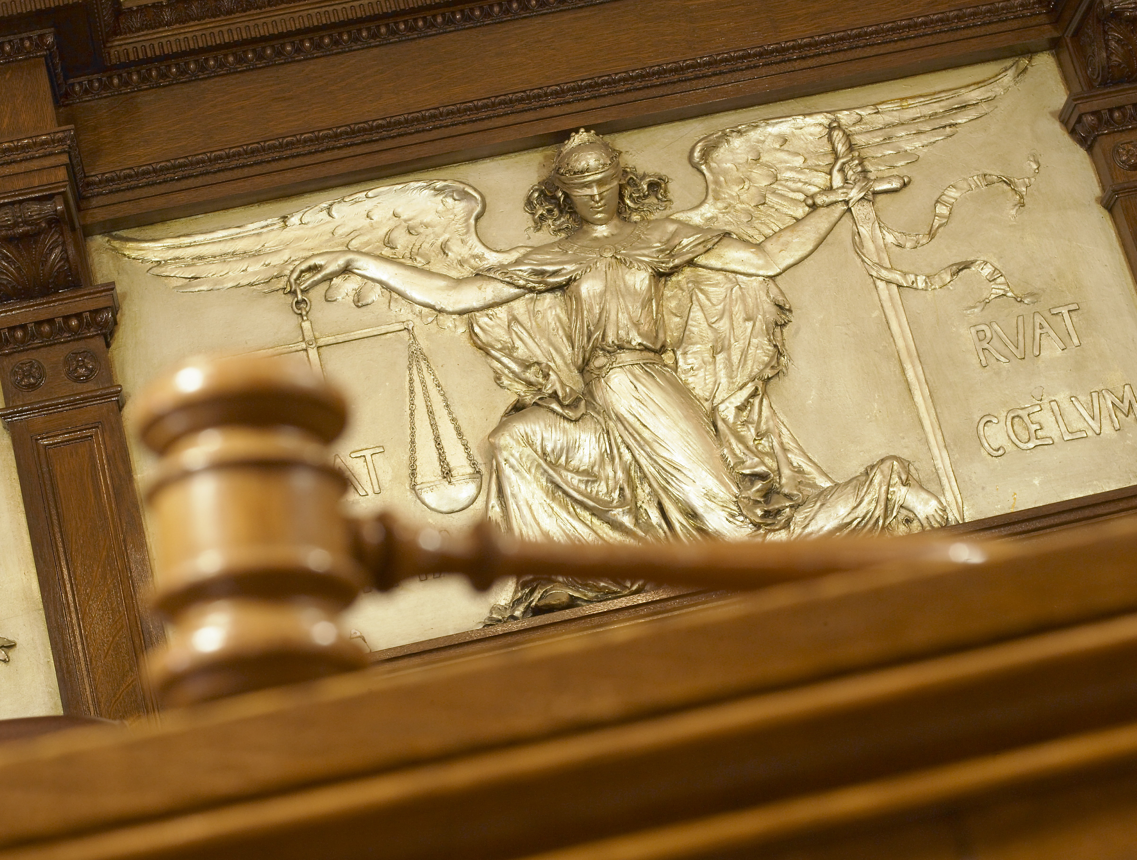 Gavel and Figure of Justice