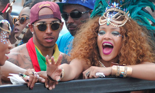 Rihanna and Lewis Hamilton are pictured partying during Barbados' Kadooment Day Parade