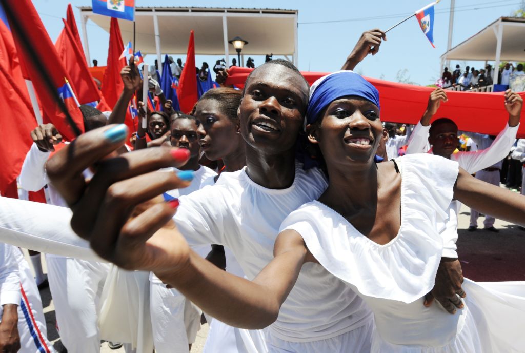 Performers dance during a ceremony marki