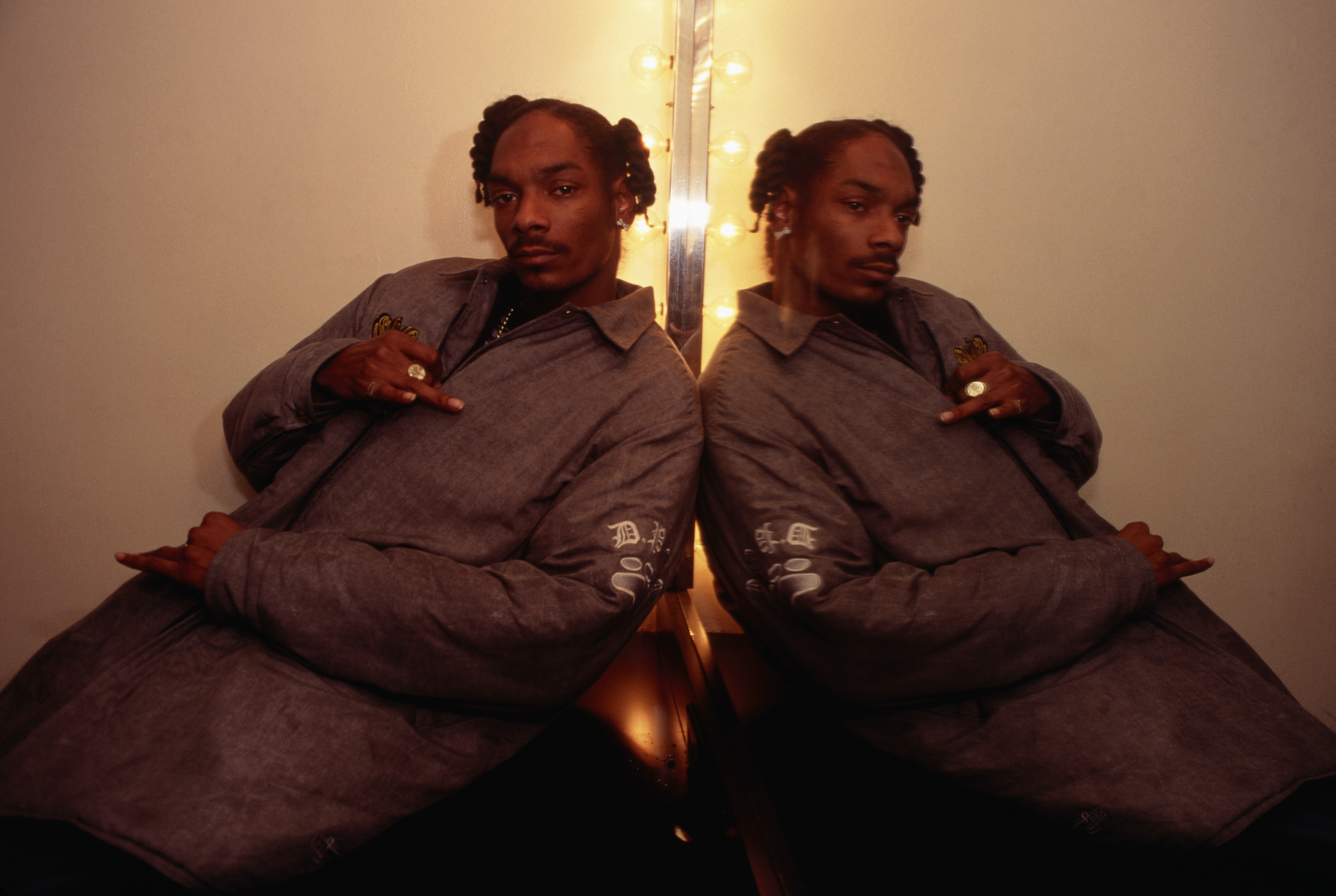 Snoop Doggy Dogg Posing in Front of Mirror