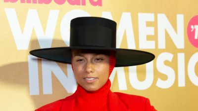 Alicia Keys wearing suit by Balenciaga attends Billboard's...