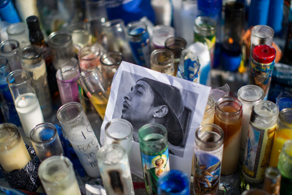 Fans Pay Respect At Scene Where Hip Hop Musician Nipsey Hussle Was Fatally Shot In Los Angeles