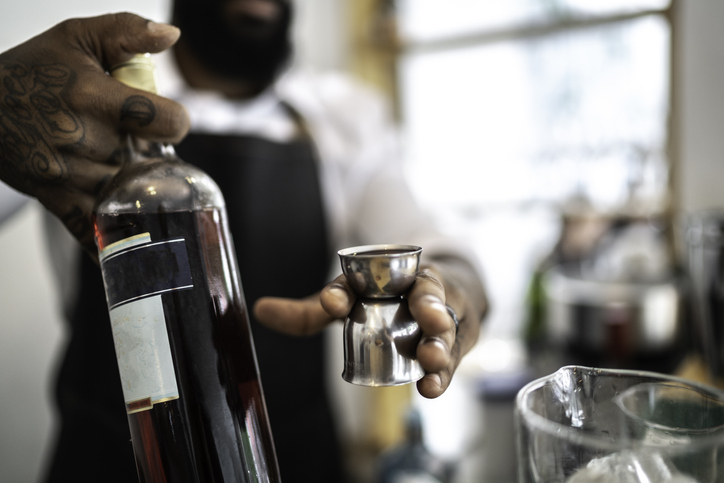 Bartender preparing a drink in the bar