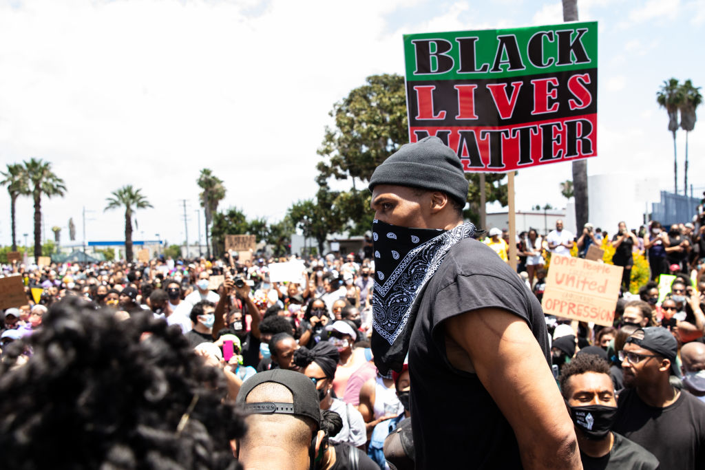 The Compton Cowboys participate in a Compton Peace Walk