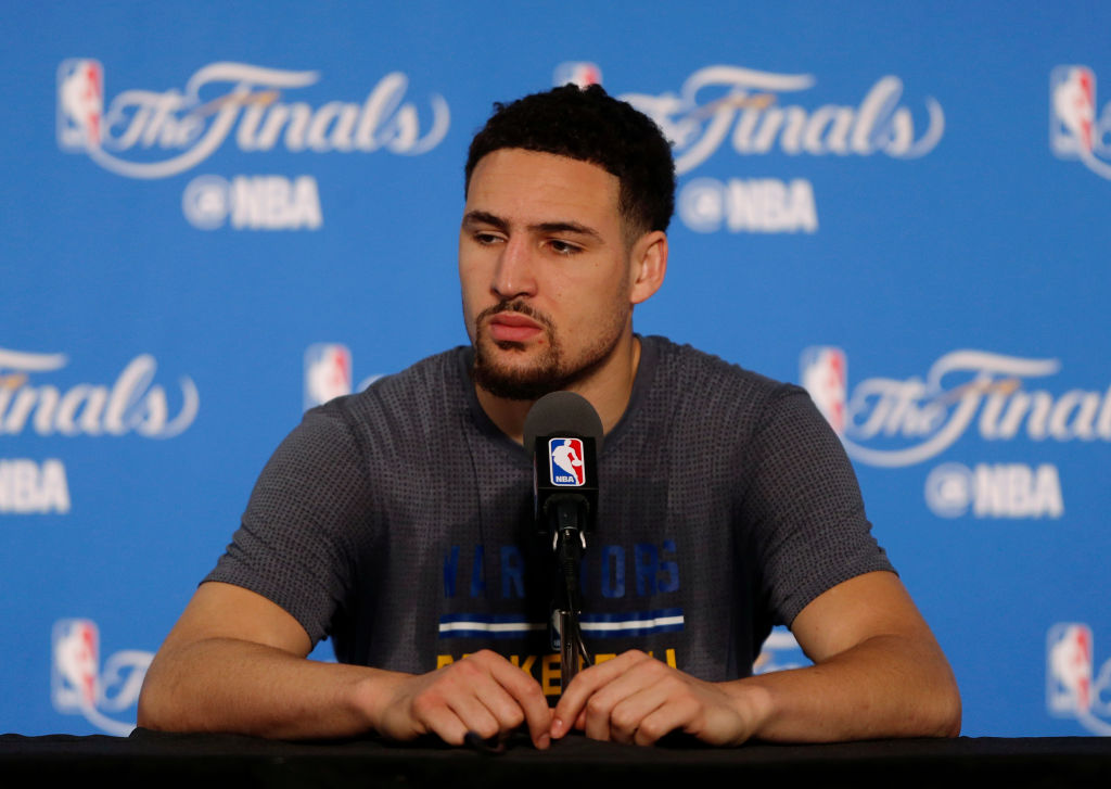 Golden State Warriors' Klay Thompson (11) listens to a question during media day the day before Game 1 of the NBA Finals at Oracle Arena in Oakland, Calif., on Wednesday, June 1, 2016. (Nhat V. Meyer/Bay Area News Group)