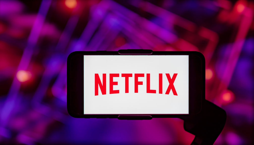 In this photo illustration, the Netflix logo is seen...