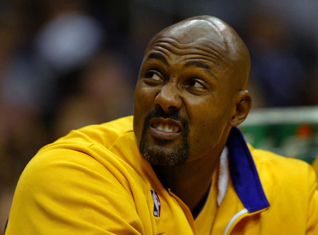 10/17/2003  Karl Malone doesn't like what he sees as he sits on the bench during a preseason game b