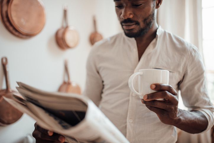 Man Holding Coffee Cup